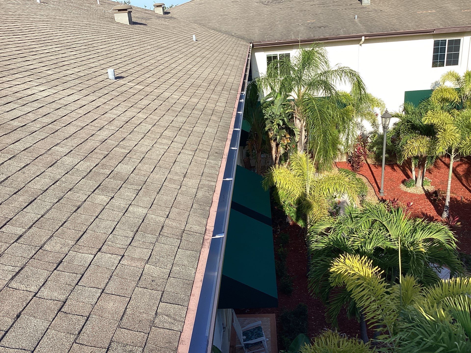 Musket Brown Seamless Gutters using Musket Brown Seamless Gutters in Capen Coral FL by Gutter Professors