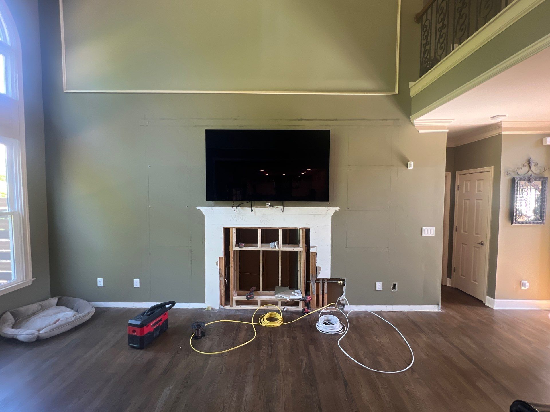 Custom Stone Fireplace and White Built-in Cabinetry in Suwanee by Swift Home Renovations