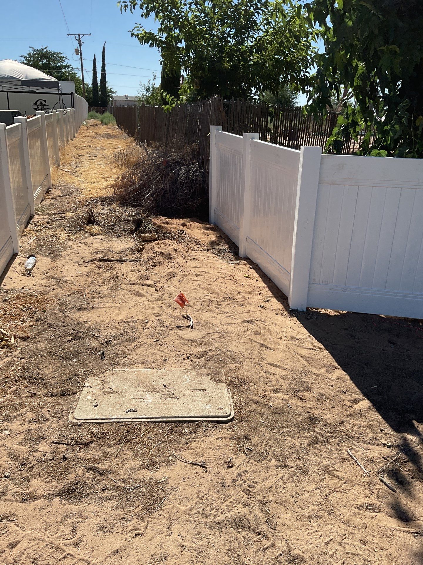 4ft White Vinyl Fence with Solar Power Motorized Gate by Fence Guys Inc.
