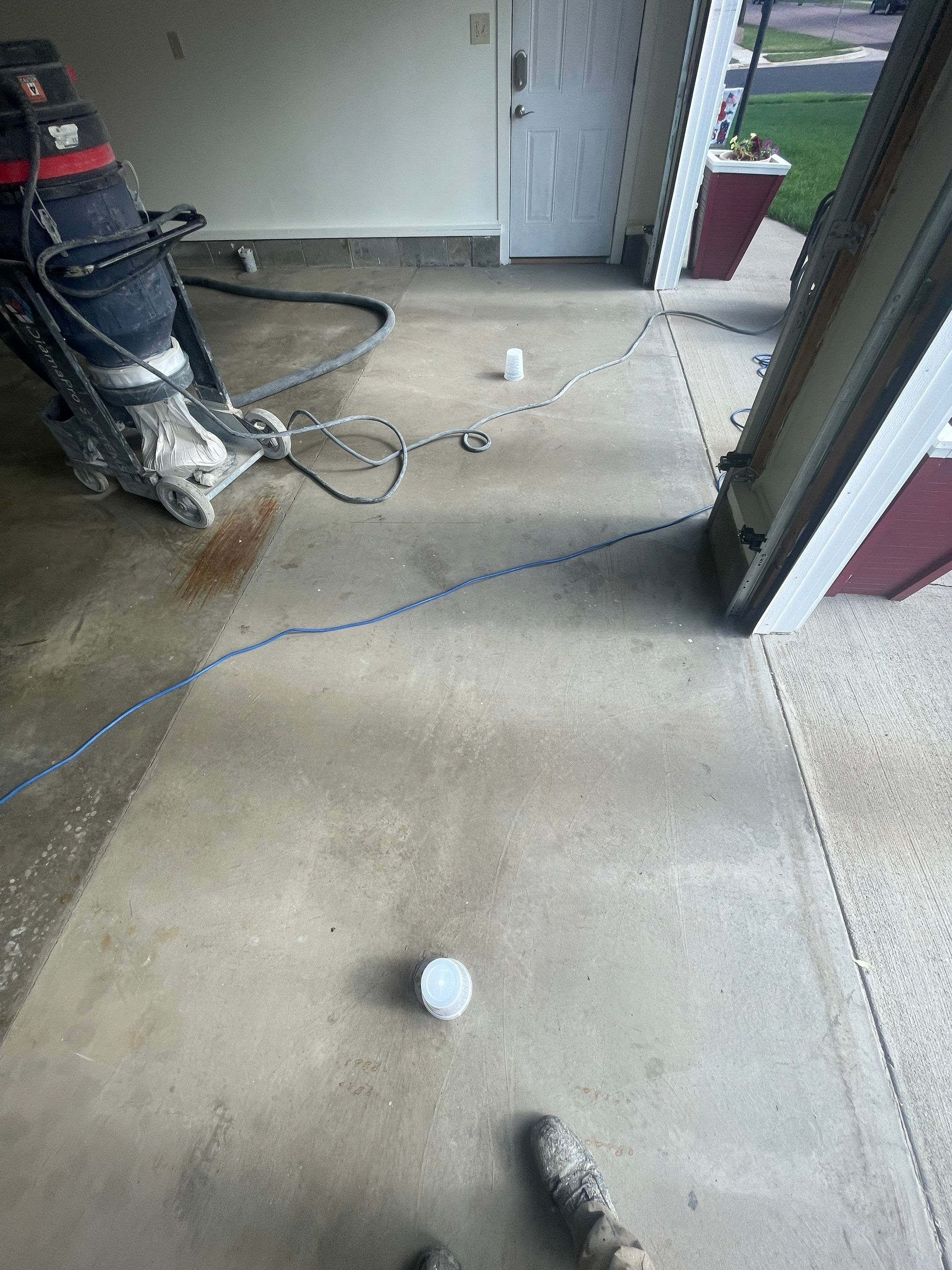 Madison Garage Concrete Coating with Feather Grey Speckle Finish by Select Painting, Coatings & Garage Cabinets