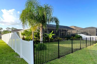 Vinyl Fence Installation and Black 3 Rail Aluminum Fence