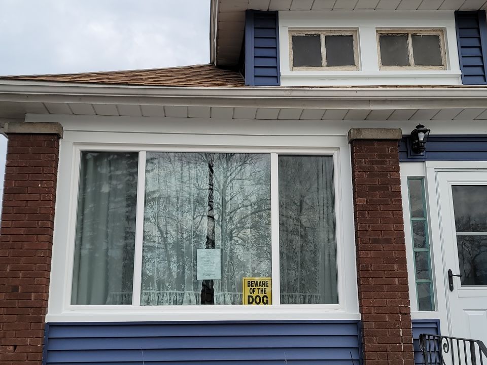 Window Installation using vinyl windows by Kraz Construction