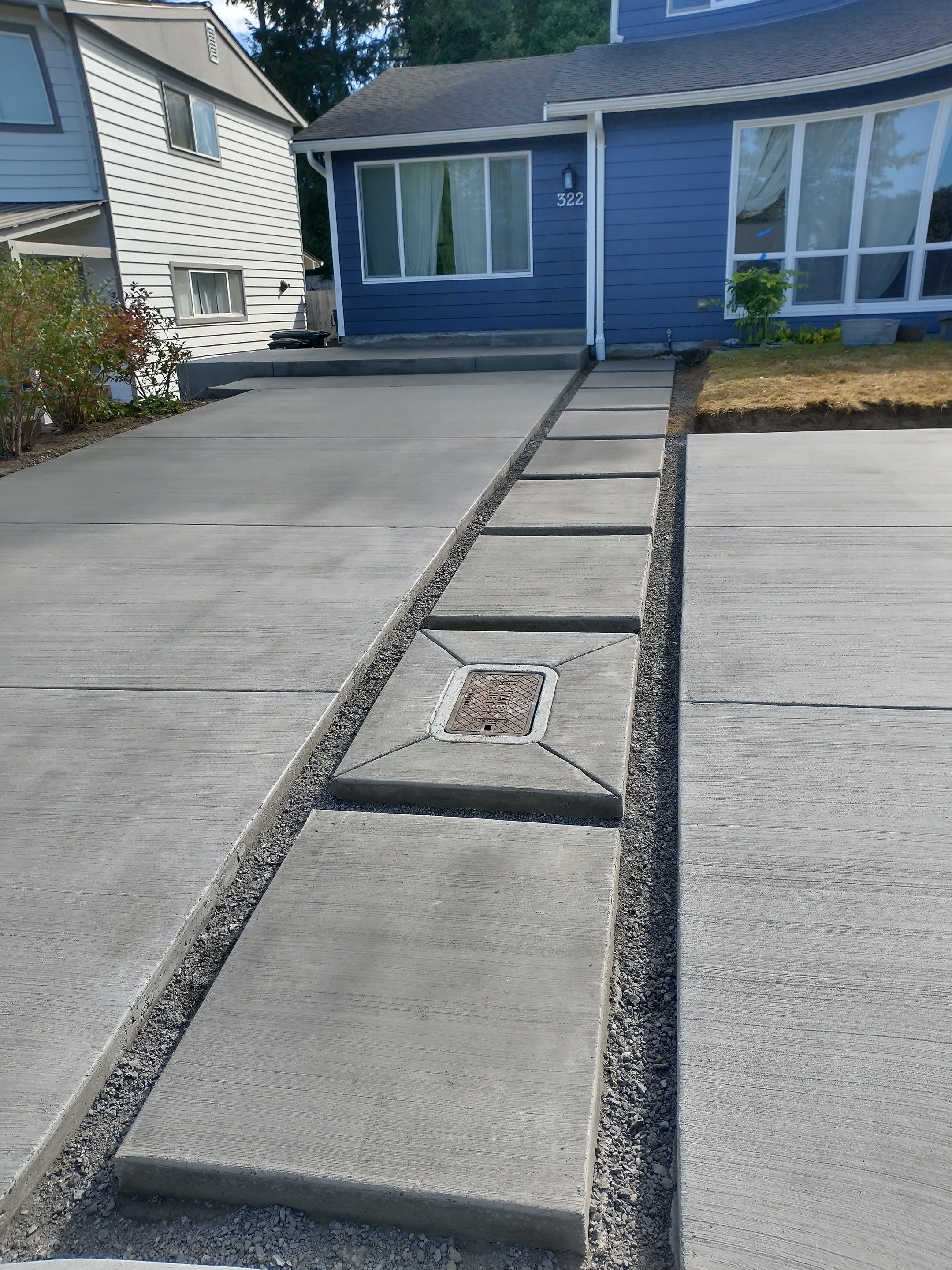 Custom Concrete walkway/Driveway Everett WA by Jireh Asphalt & Concrete Inc 