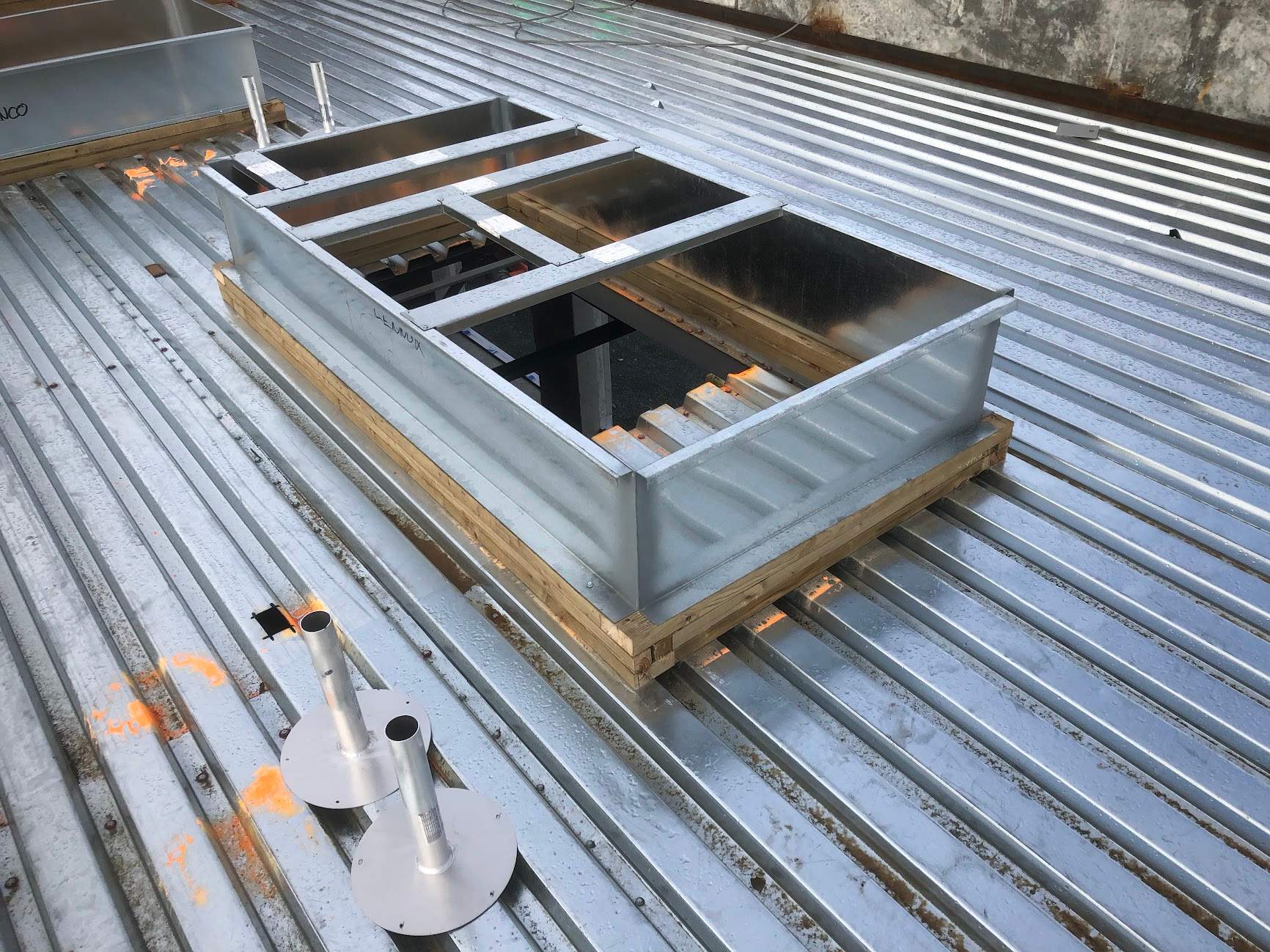 Commercial Roofing Installation using EPDM loose lay with balast by Top Notch Roofing Inc