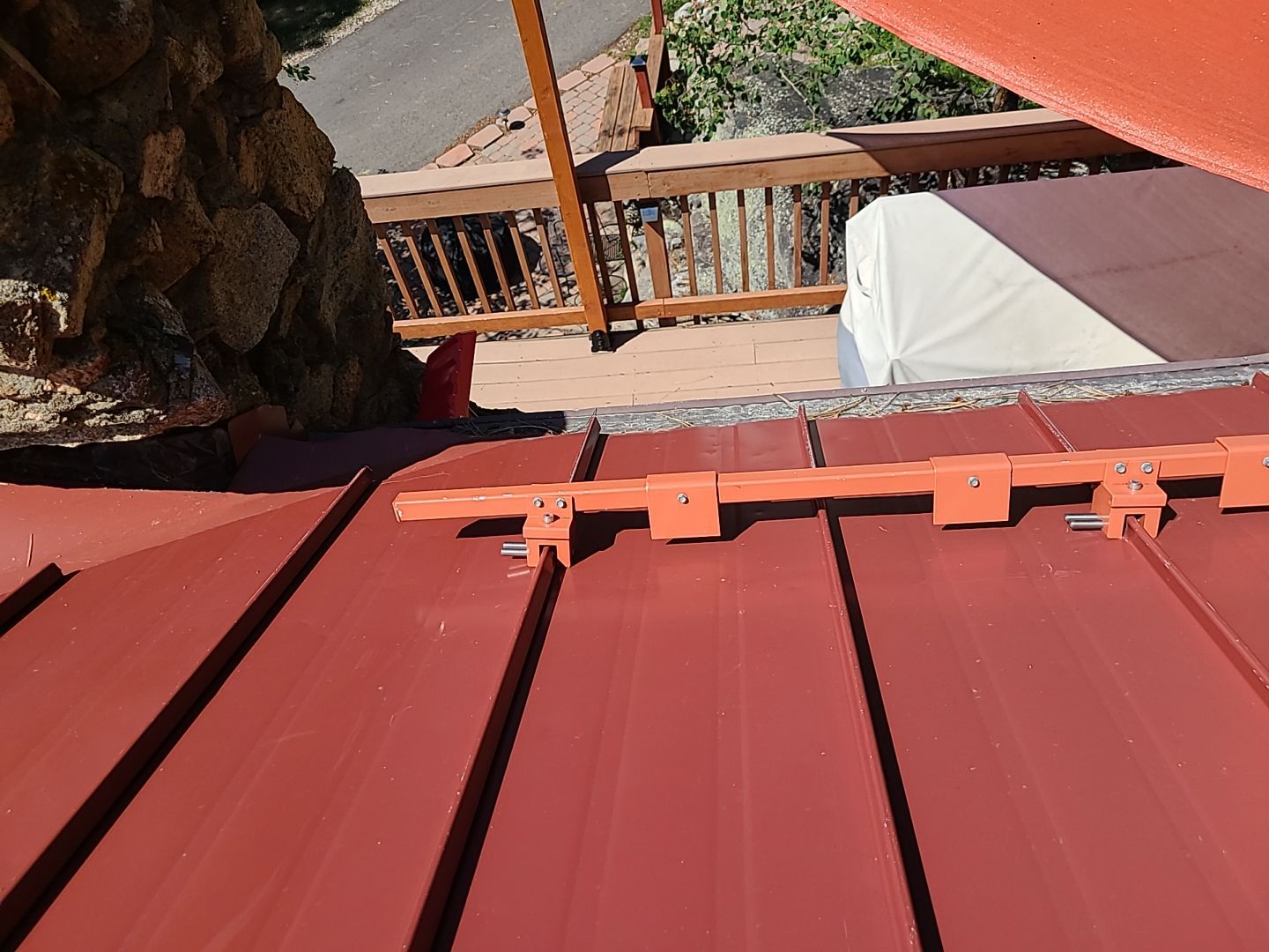 Residential Roofing Installation using Standing Seam Metal by Blue Peaks Roofing LLC 