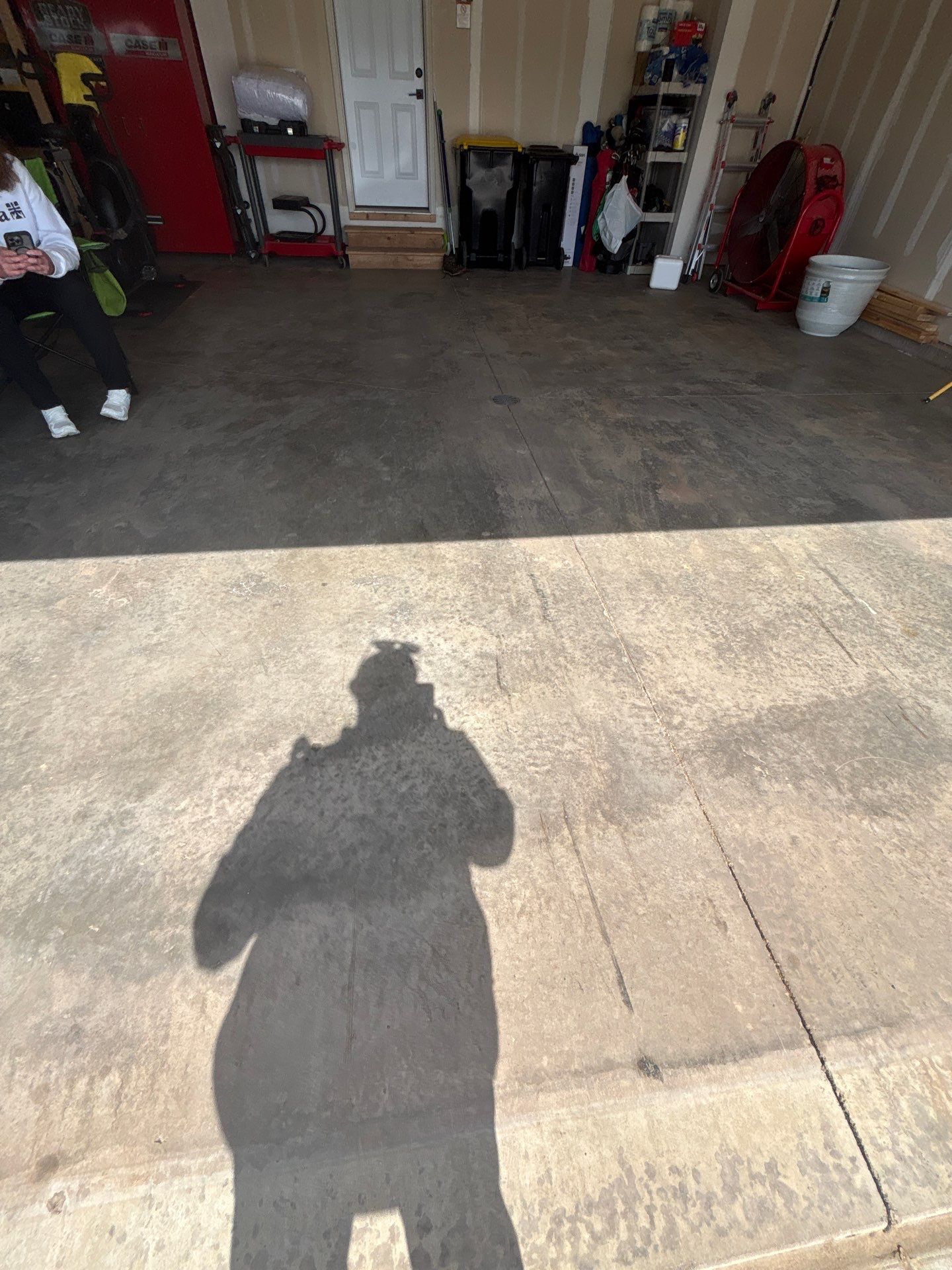 Grey Flake Epoxy Garage Floor Coating in Sioux Falls by Select Painting, Coatings & Garage Cabinets