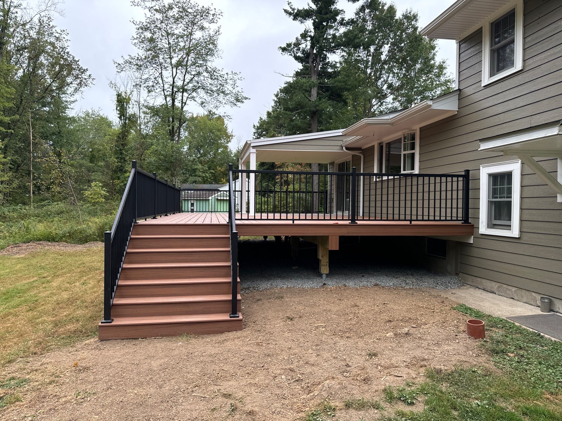 New Deck using Trex Tiki Torch  by deck guardian