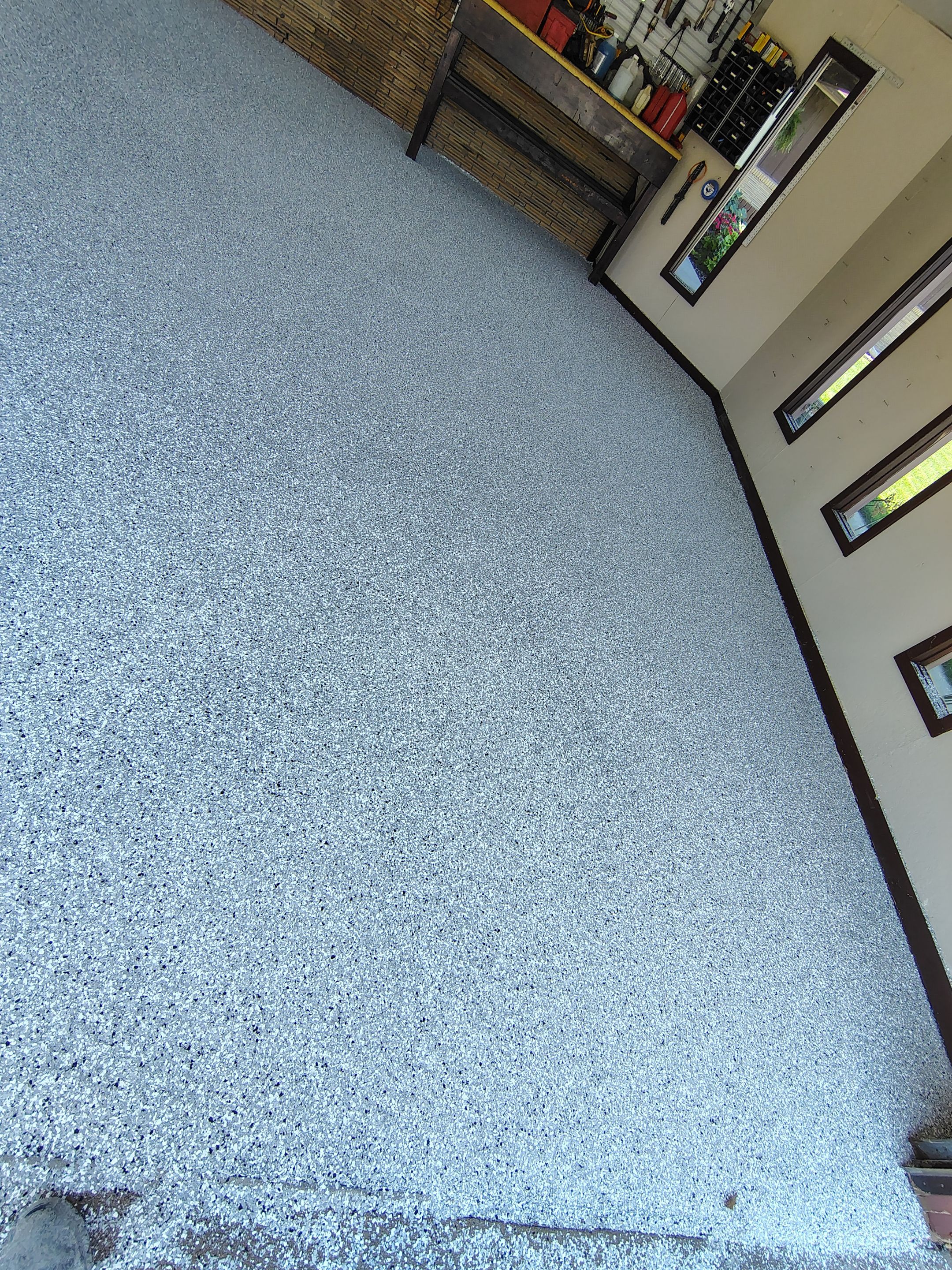 Garage Floor Coating with Crack Repair in Yankton by Select Painting, Coatings & Garage Cabinets