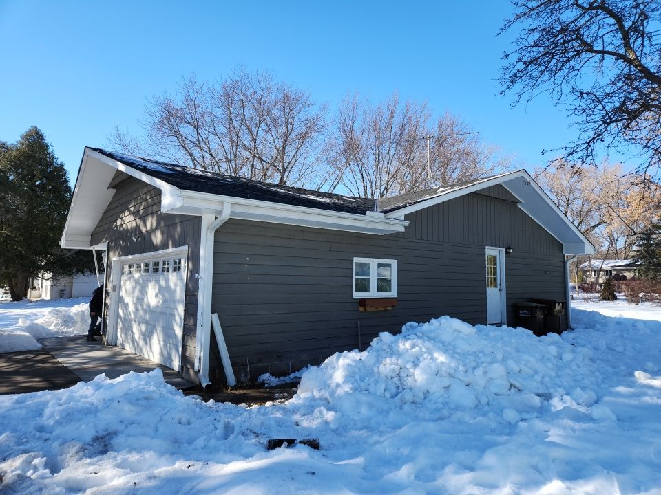 Steaming and Installing New Covers and Heating Cable by Next Level Seamless Gutters / Exteriors Inc.
