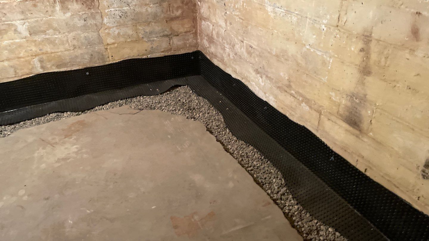 Interior Drain Tile for a South Minneapolis Basement by Waterproofing Northeast