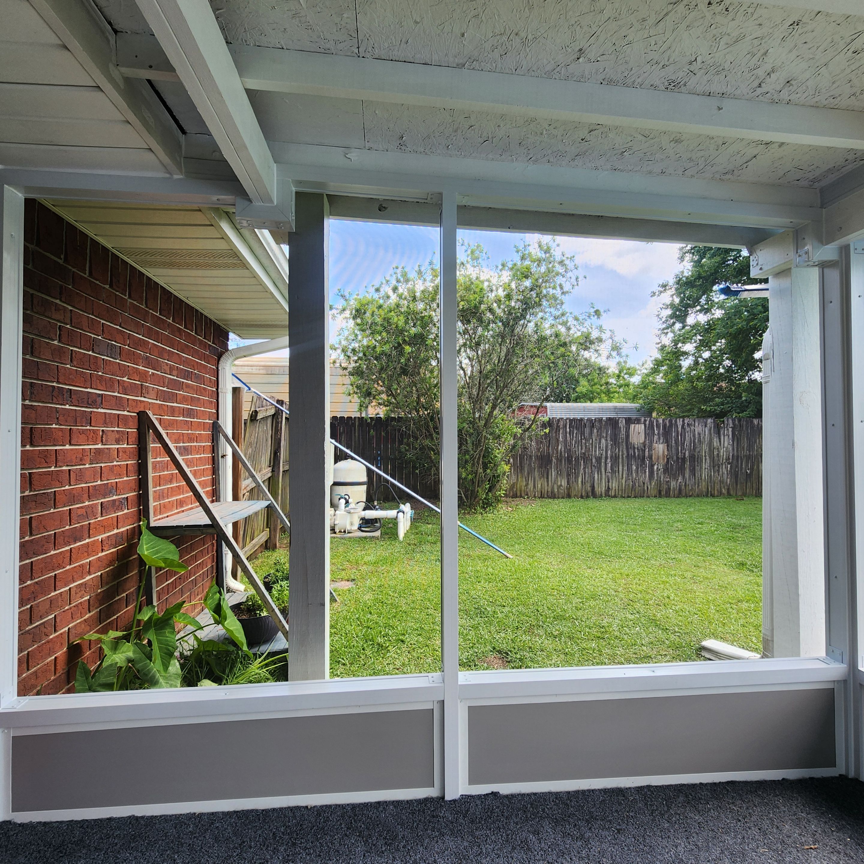 Screen Room Built Under Existing Roof by Titan Sunrooms