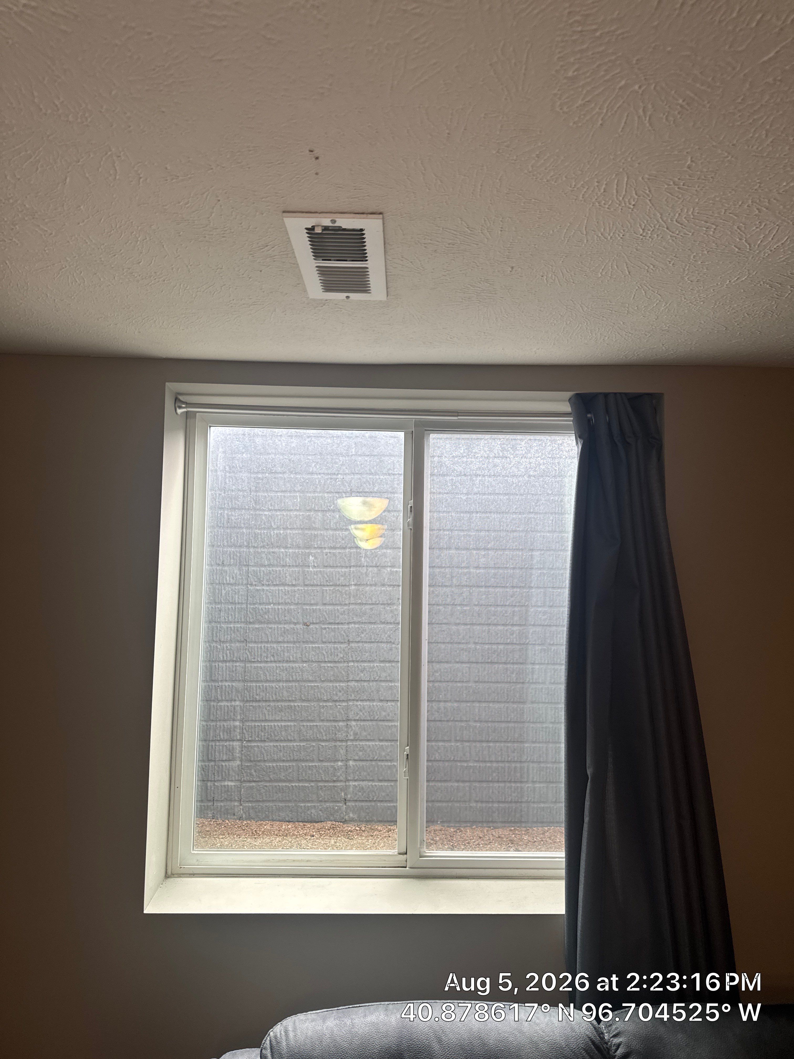 Basement Egress Window Installation with Stone-Textured Liner in Lincoln by CompanyCam Sales Demo
