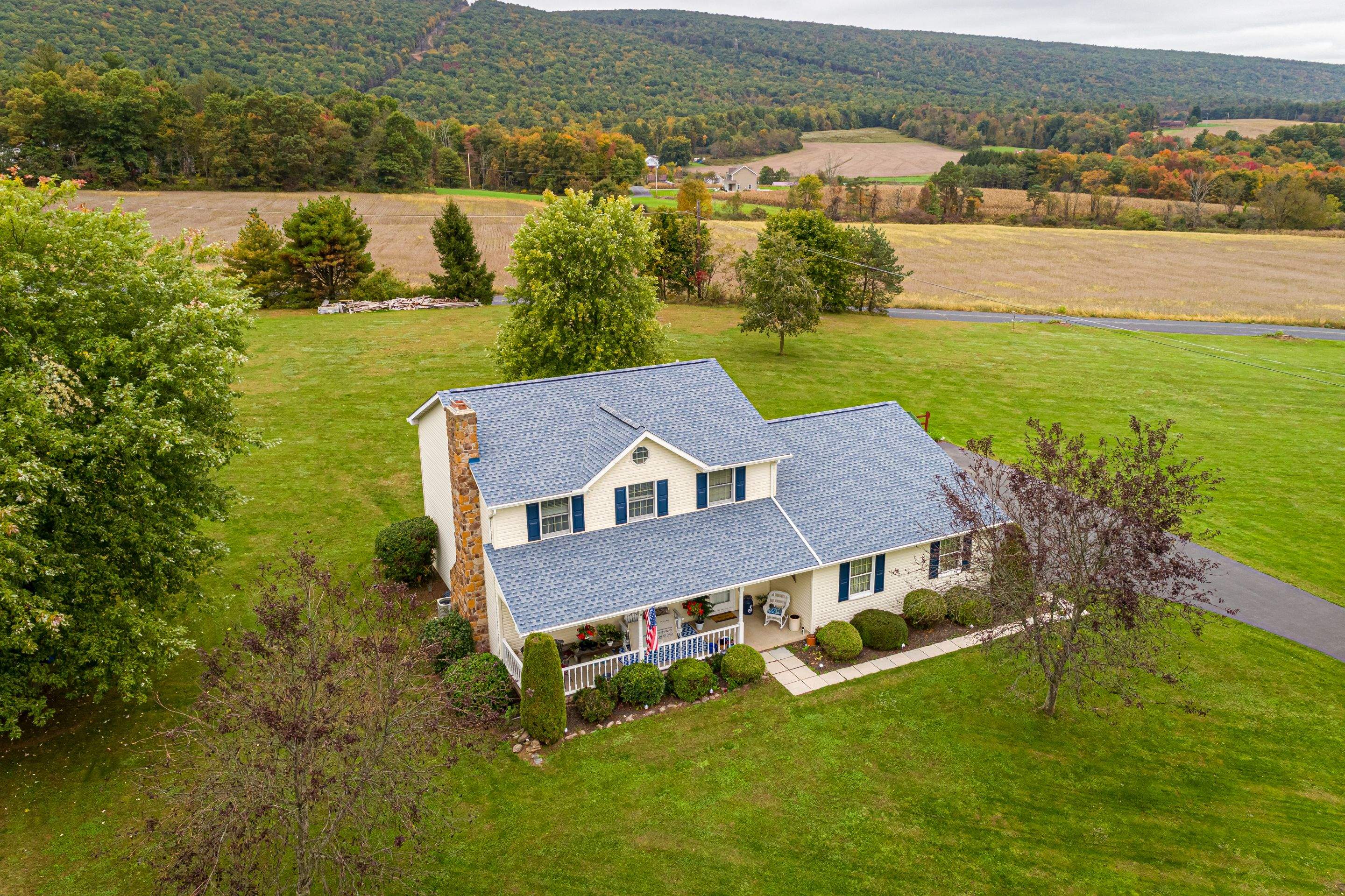 Shingle Roof-biscayne blue- and windows by Esh Builders
