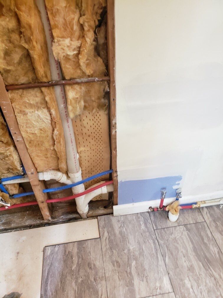 Bathroom Remodel using BCI Acrylic Shower System by Secure Construction Company Inc