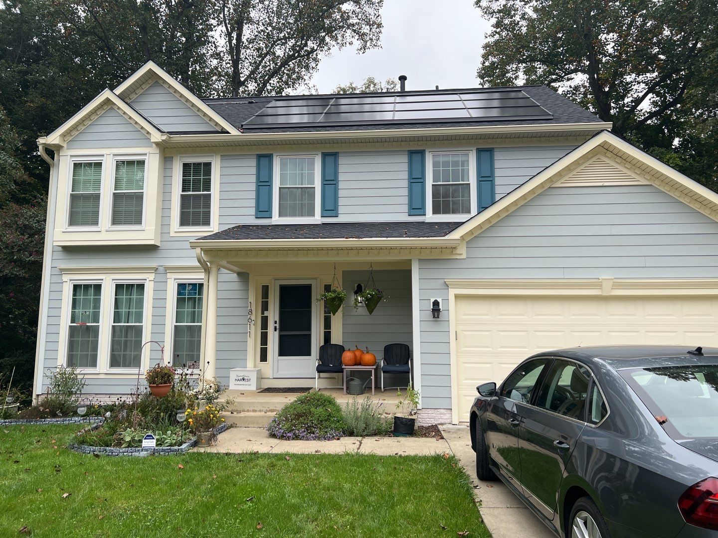 Exterior Home Makeover using GAF Timberline HDZ, GAF Decotech, and James Hardie Siding by American Home Contractors
