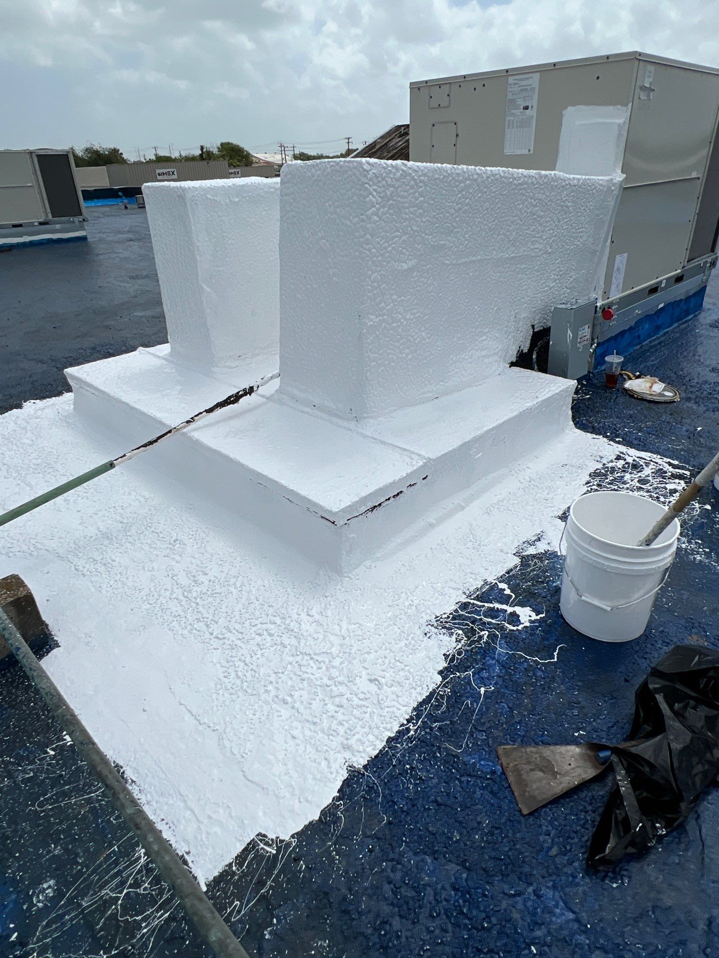 Dirty leaking Gravel Roof by Bayfront Roofing and Construction