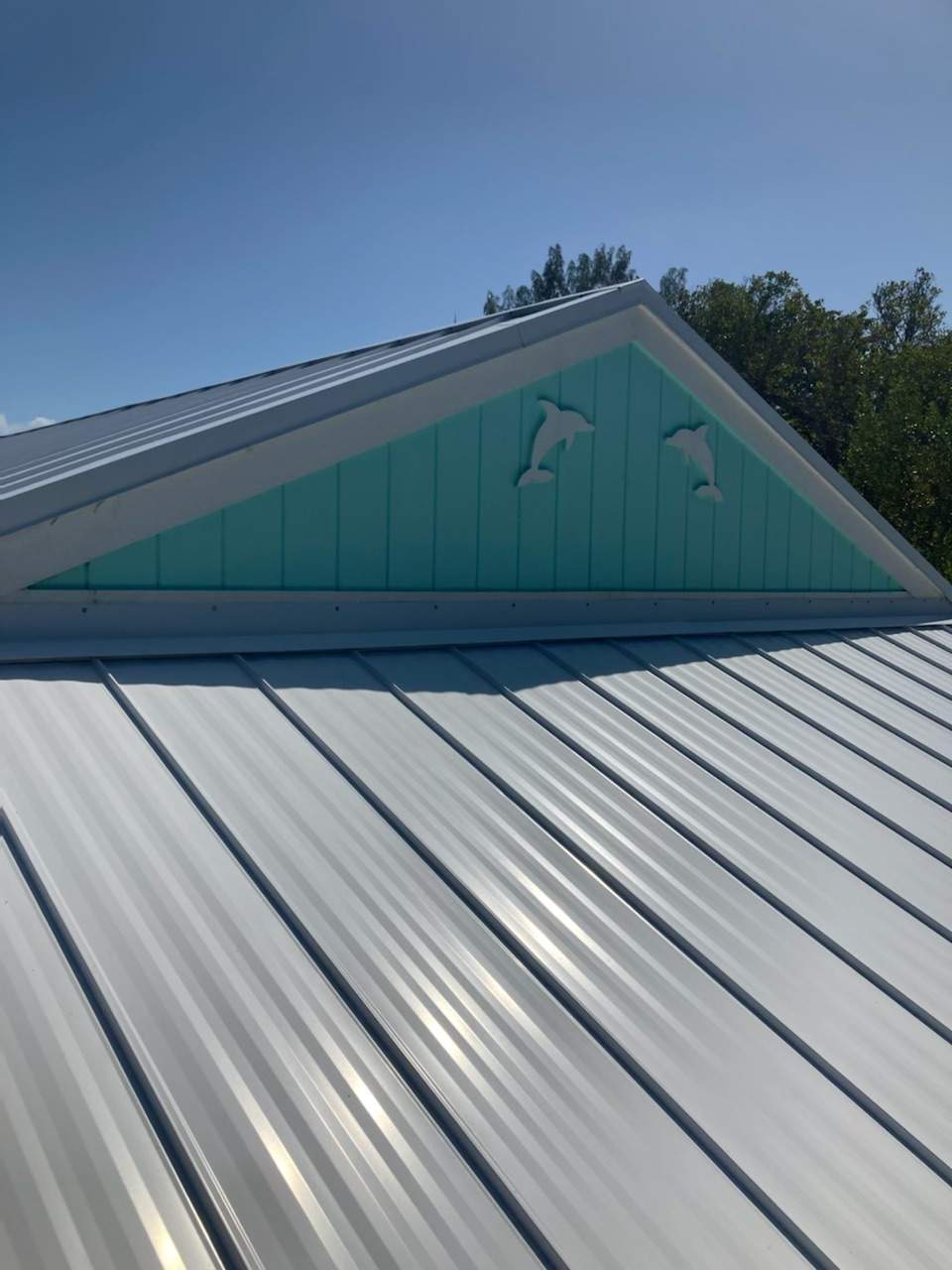 Residential Roofing Installation using Gulf Coast Metals Gulf Seam Panels by Four Peaks Roofing