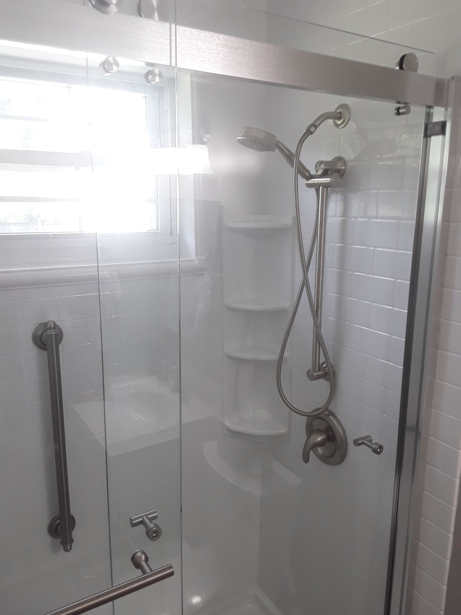 Tub to Shower Conversion using BCI Acrylic Shower System by Secure Construction Company Inc