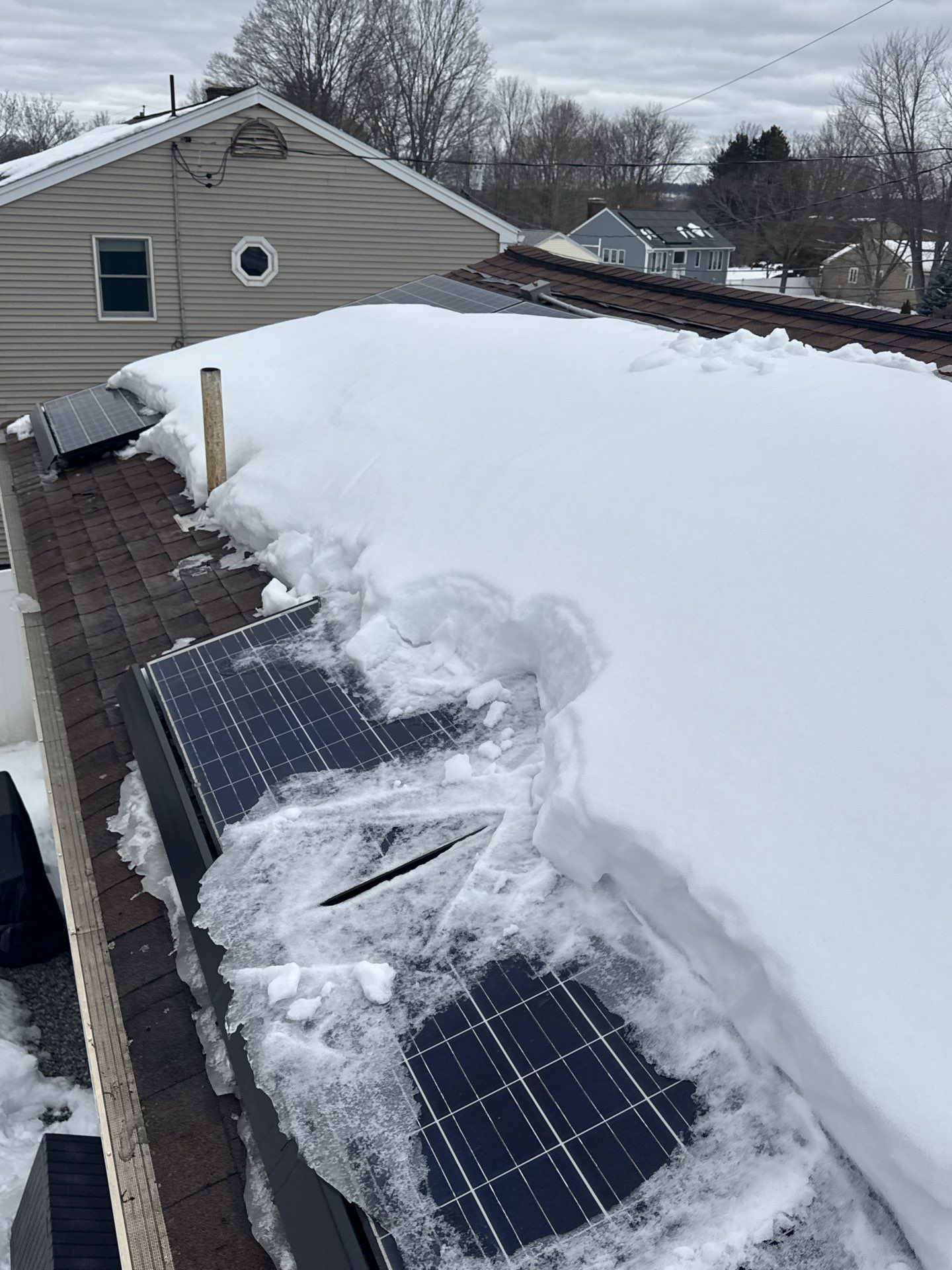 Ice Dam Removal & Snow Removal in Woburn, MA by Mighty Dog Roofing of Greater Middlesex County