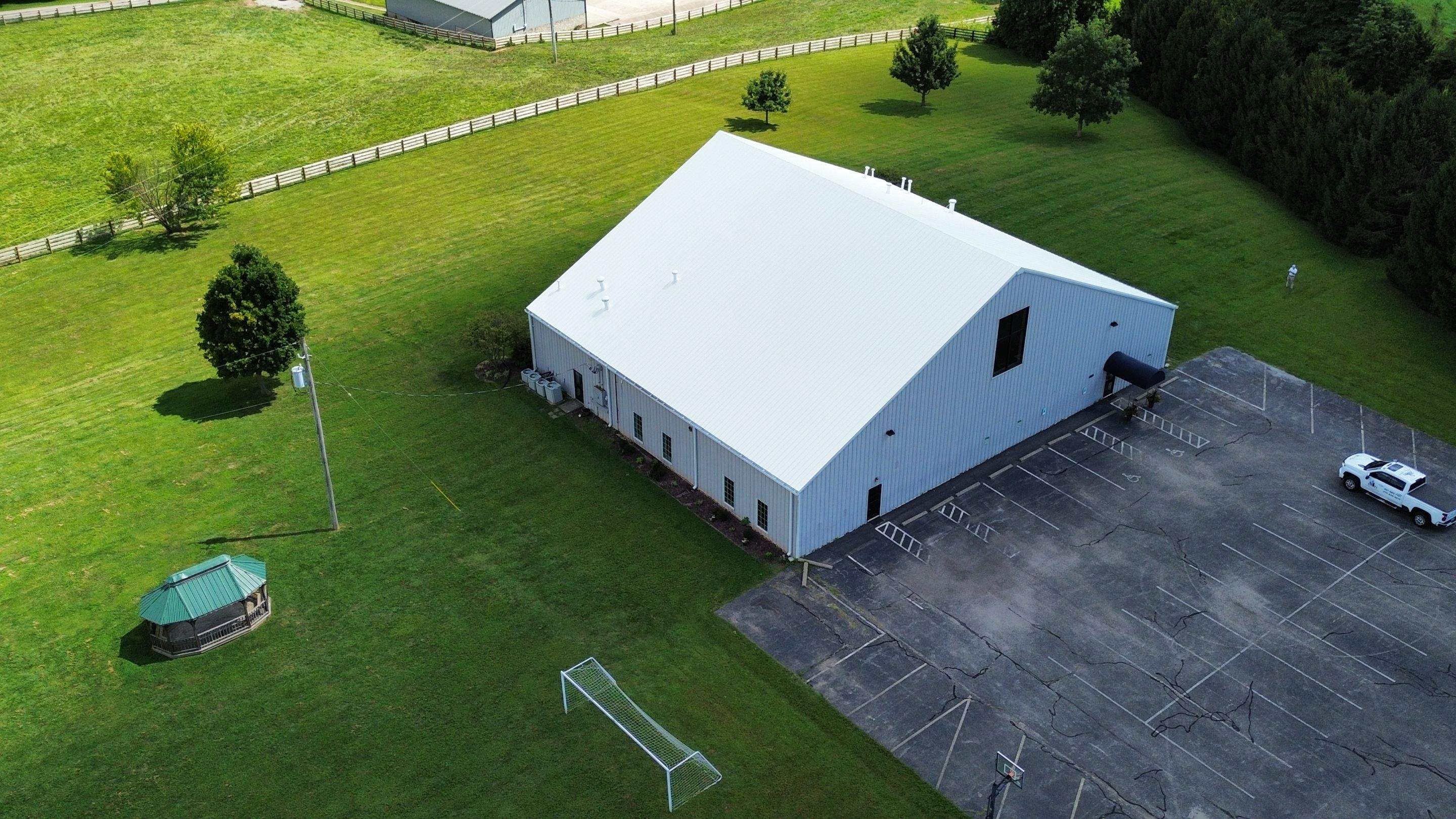 Metal Roof Restoration by Commercial Roofing Pros