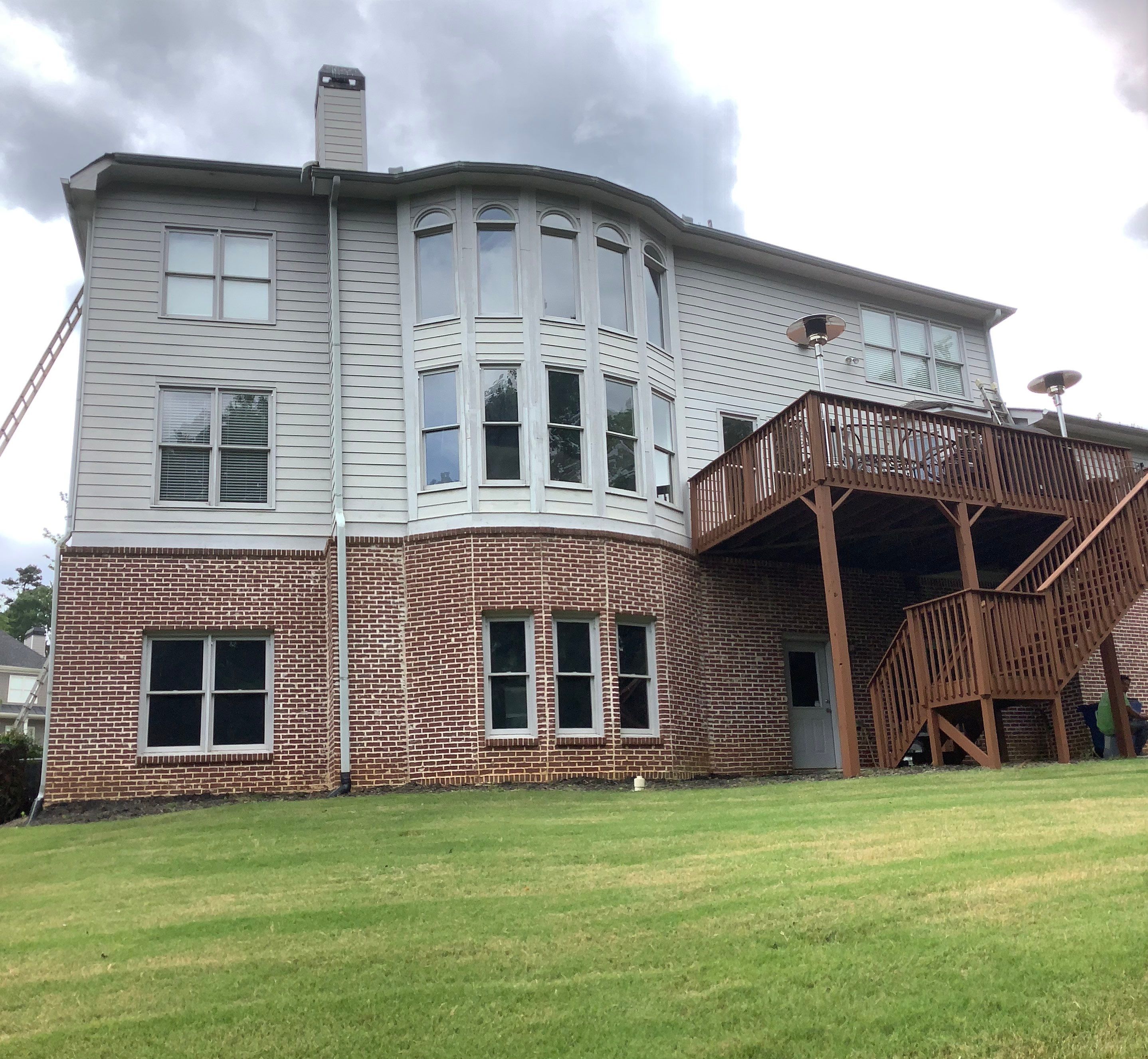 Exterior Painting and Deck Refinishing for Dacula Residential Home by Swift Home Renovations