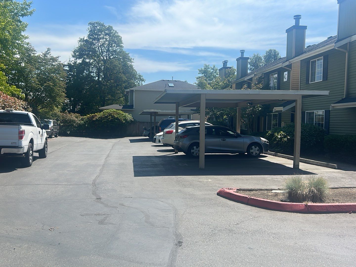 Townhomes On Center | Seal Coating & Striping by Jireh Asphalt & Concrete Inc 