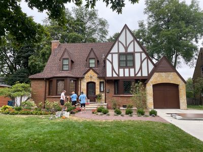 Tudor-Style Hardie Exterior Renovation in Elmhurst by Great American Exteriors