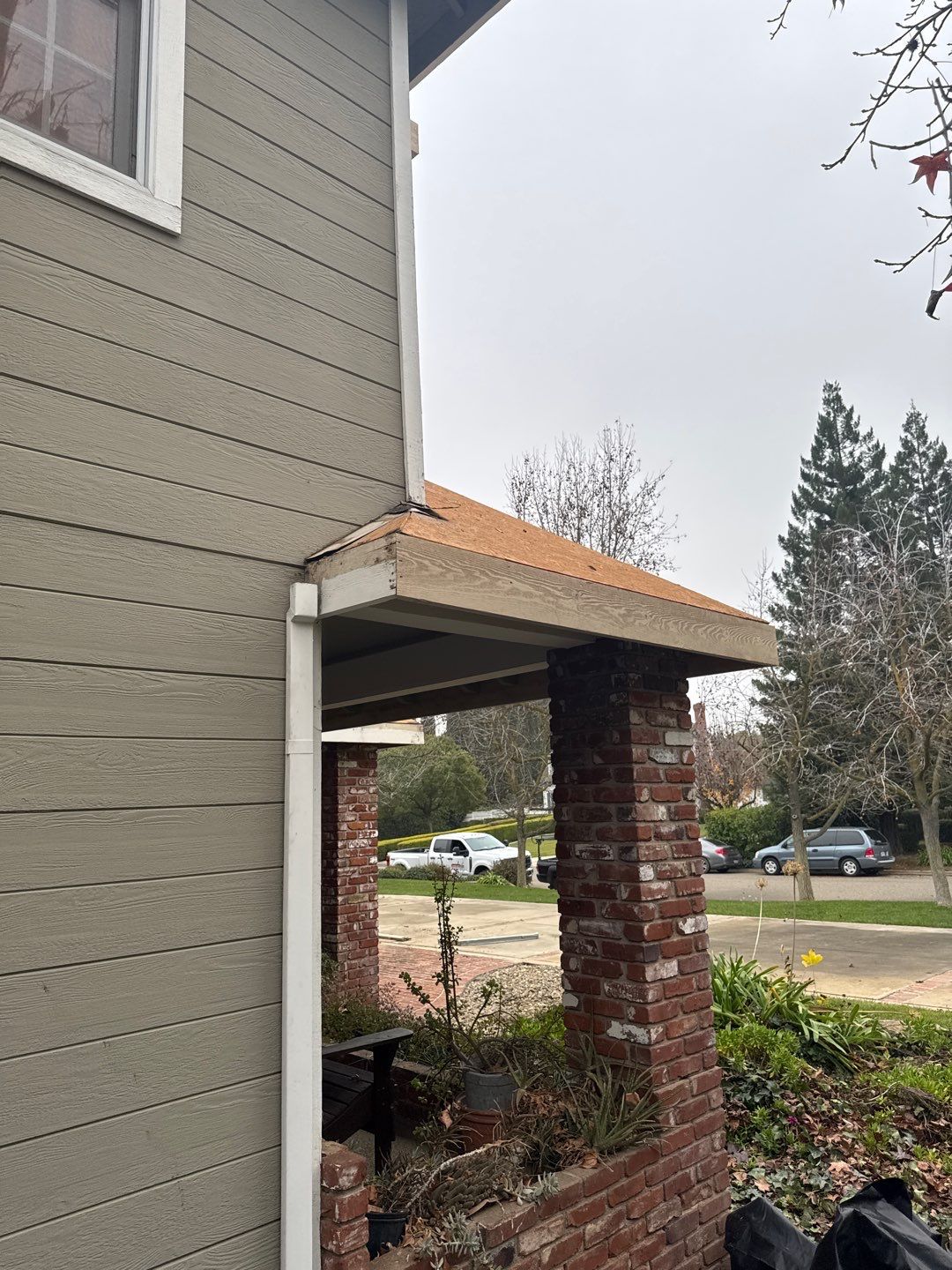 New shingles and gutters using GAF Timberline HDZ shingles and aluminum gutter by Straight Edge Roofing Inc