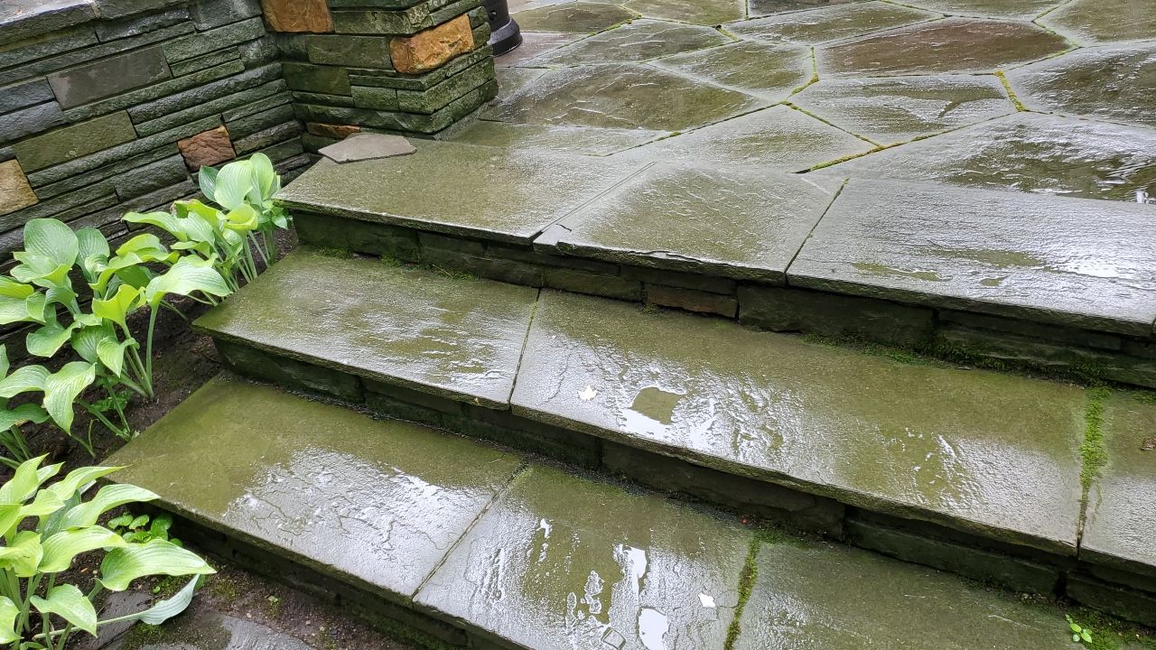 Bluestone patio cleaning by Northern Power Washing LLC.