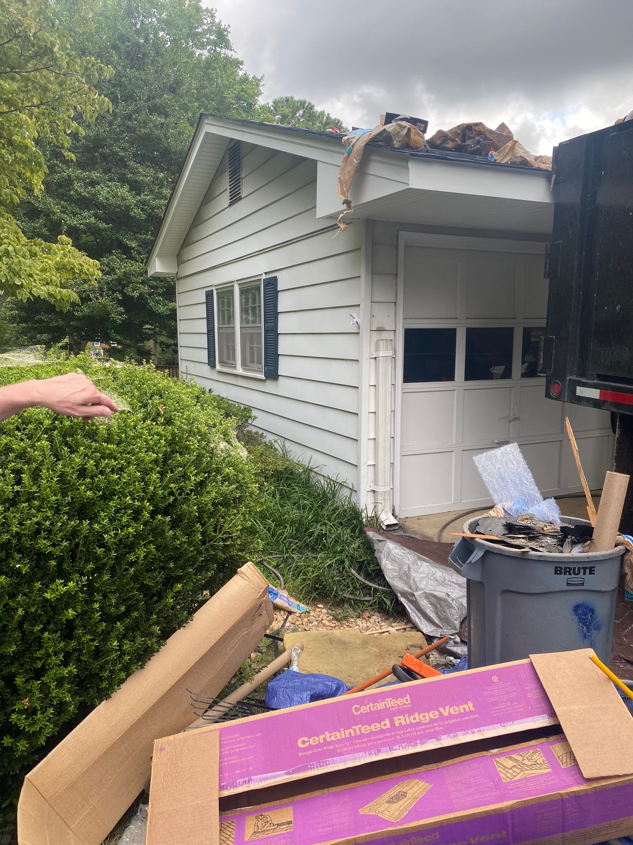 Vienna: Multi-Trade Restoration with CertainTeed Landmark Shingles in Charcoal Black by RM Banning, Inc.