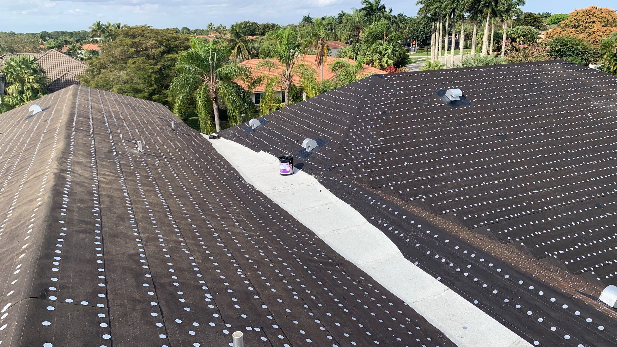 Residential Roofing Installation using 1" Nail strip metal roof by BLUES BROTHERS ROOFING