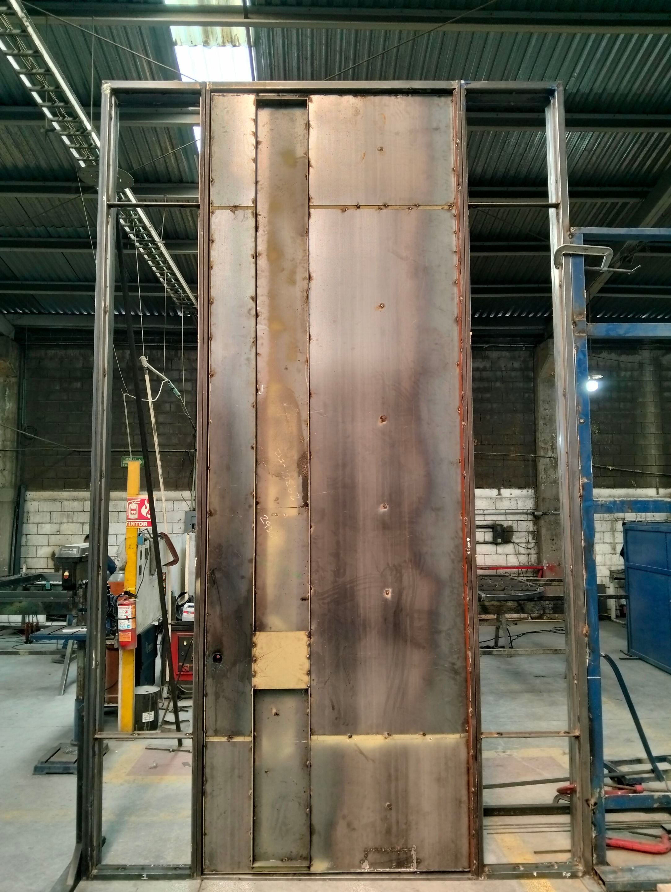Custom Pivot Door and Structural Steel Frame Installation in Fort Worth by Solara Custom Living