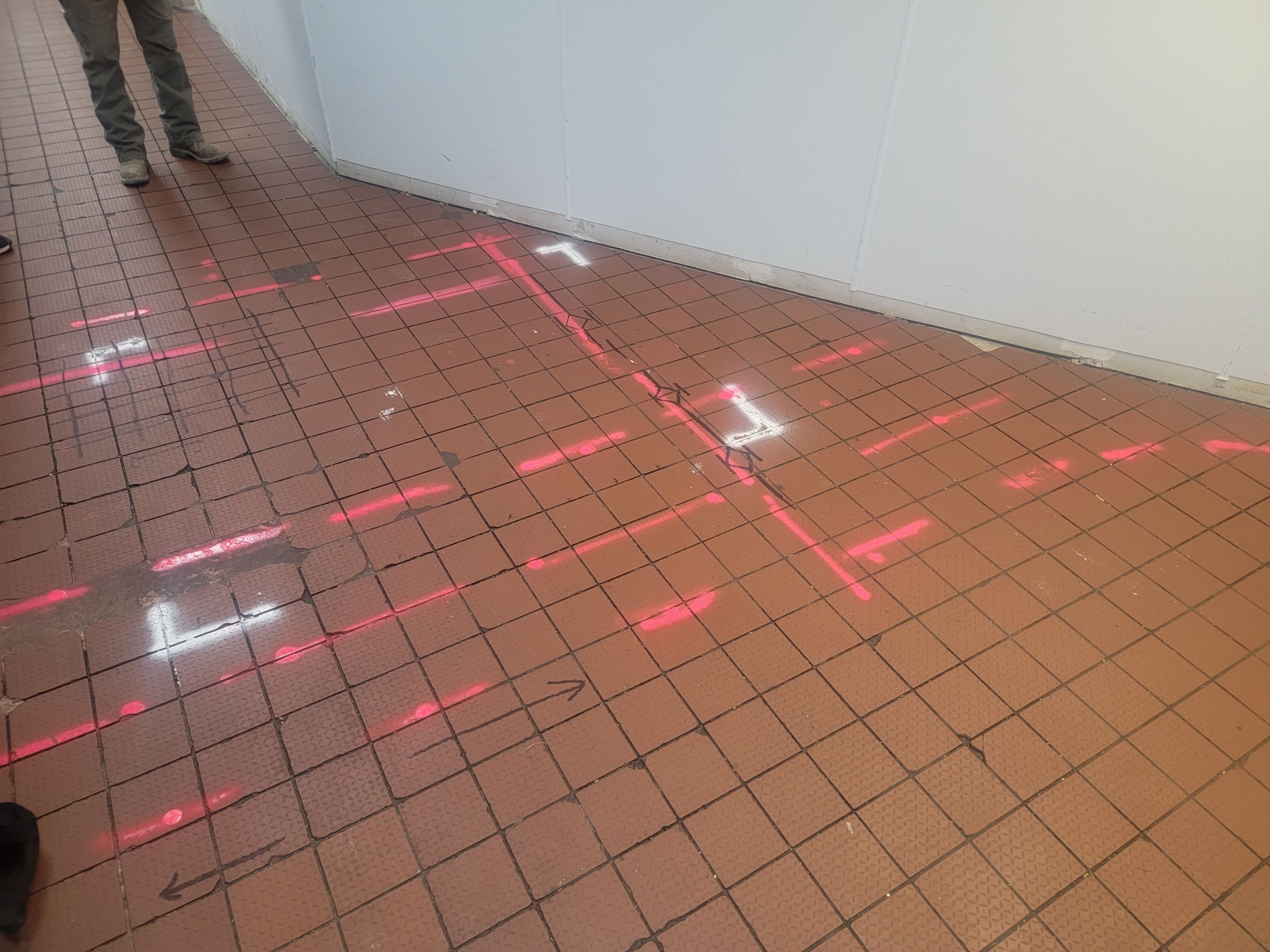 Marking Electrical Ducts within the concrete before saw cutting by Alsip Locating Service, LLC