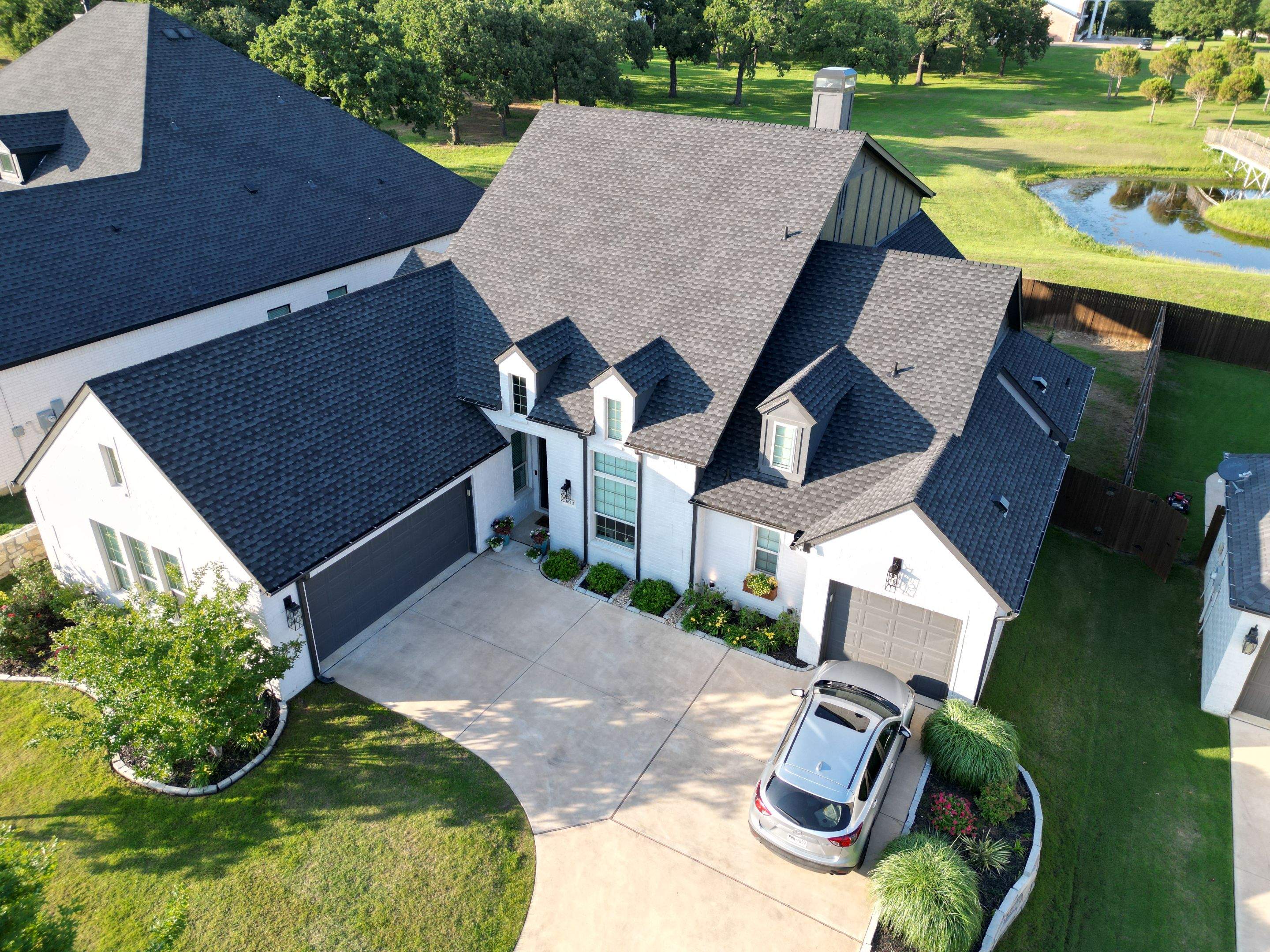 Residential Roofing Installation using GAF Timberline UHDZ Premium Shingles by Harvey Roofing & Construction