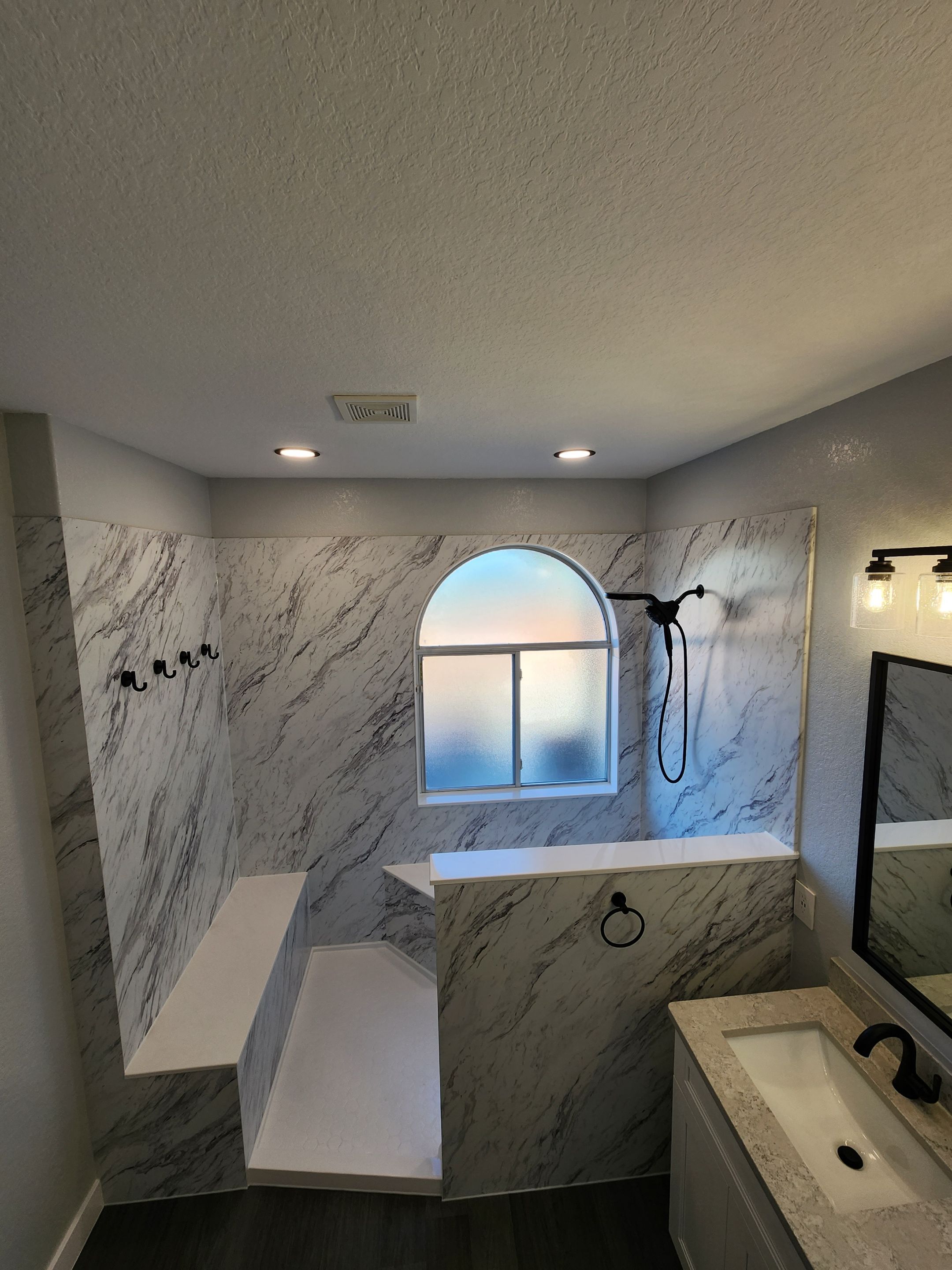 Cibolo Large Walk-In Shower Remodel with Hidden Niche and Smart Shower Controls by Legacy Bath and Kitchen