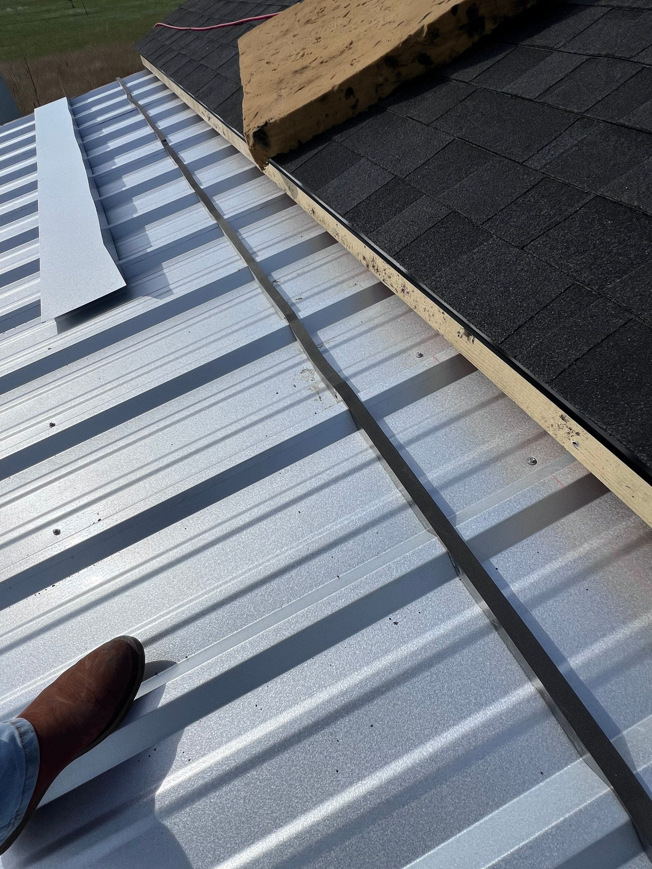 Residential Roofing Installation using Metal by Roof Repair Company