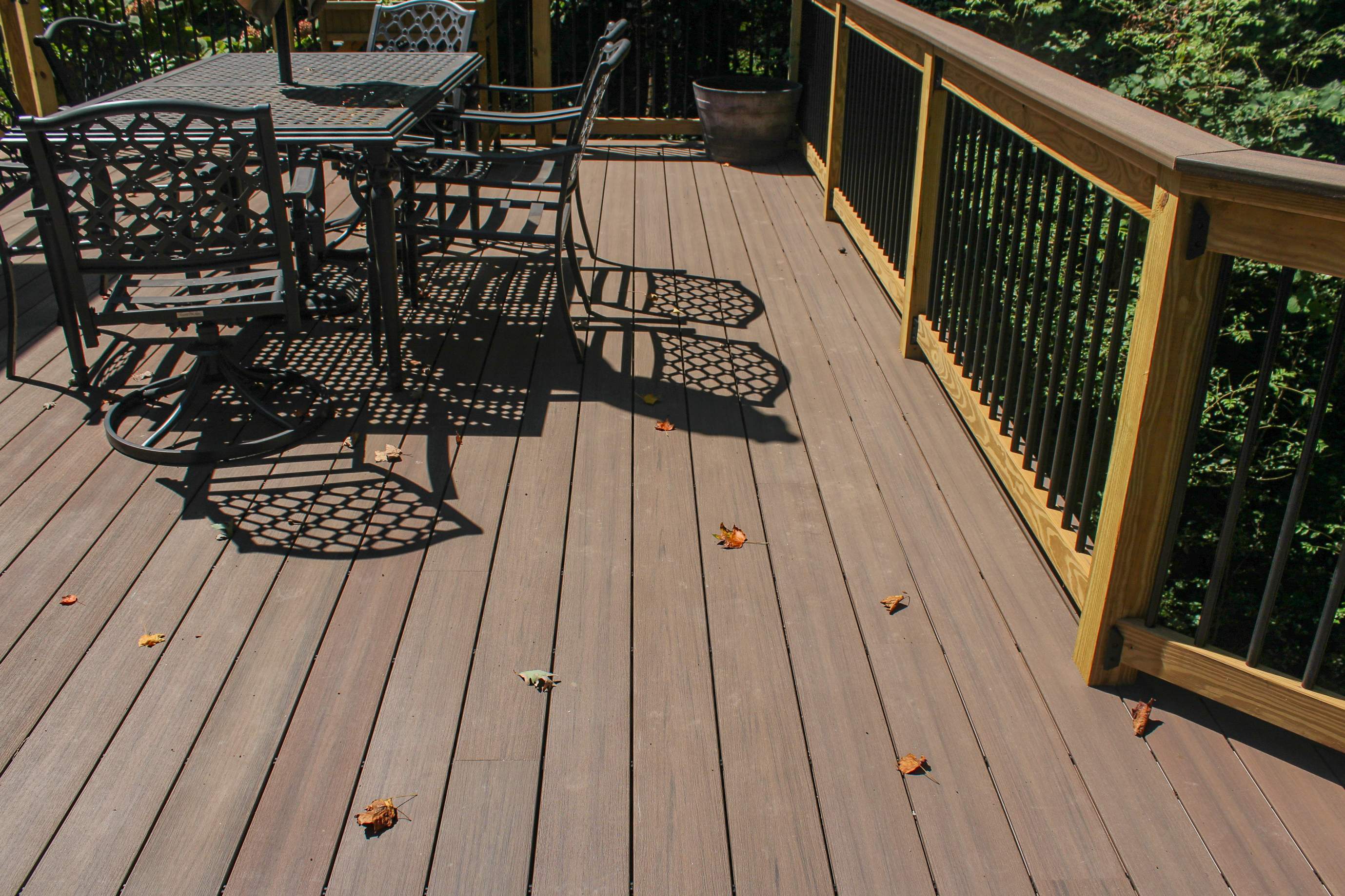 Deckorators Voyage Deck and Shed Style Covered Porch Build with Drink Rail by Nelson Exteriors 