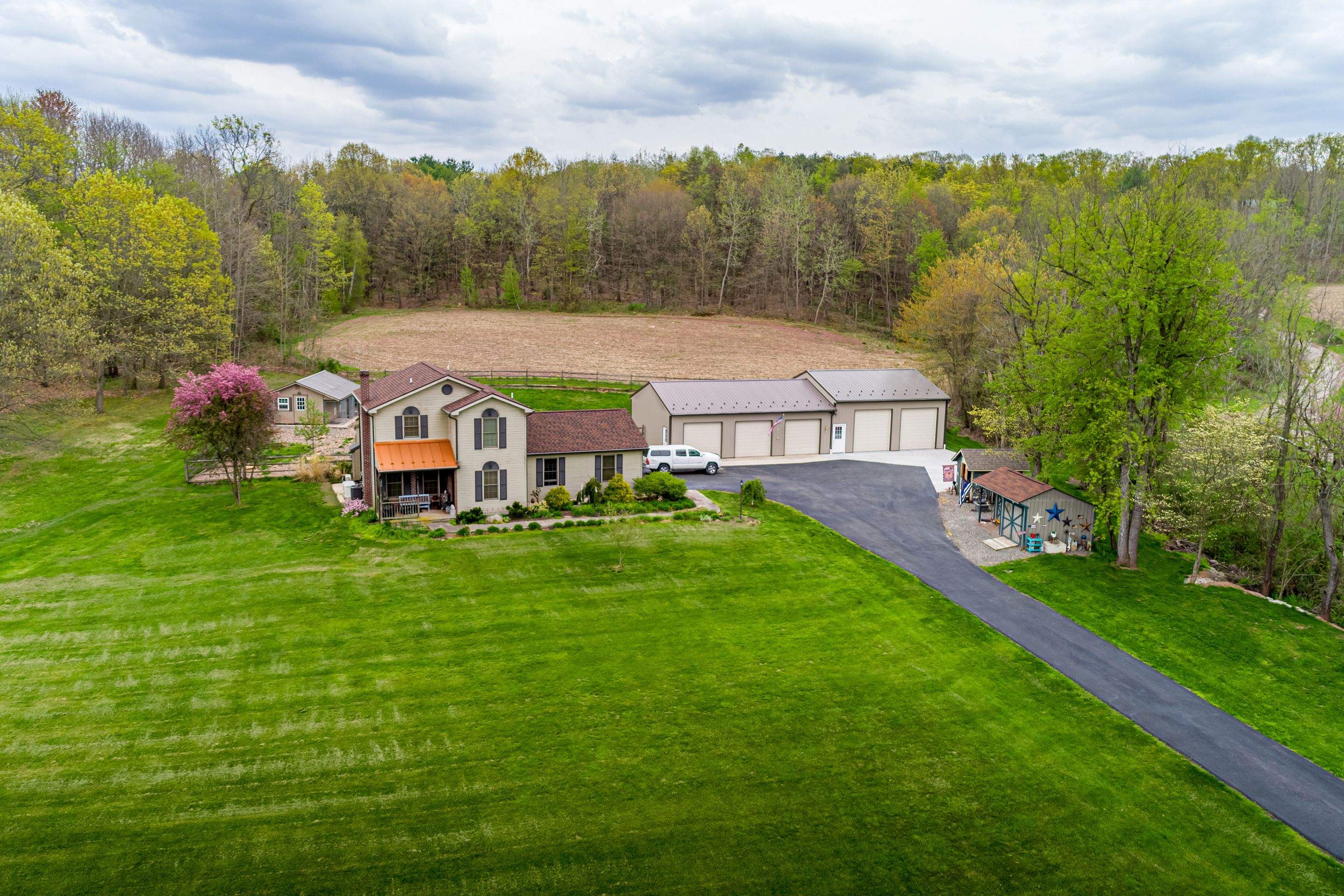 Shingle Roof-hickory, Metal Roof-bronze, Garage addition by Esh Builders