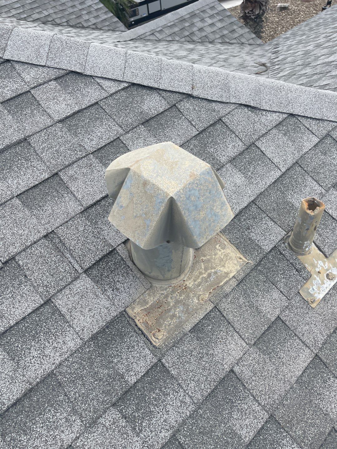 Residential Roofing Repair using Galvanized Chimney Cap & Chase by Lighthouse Roofing