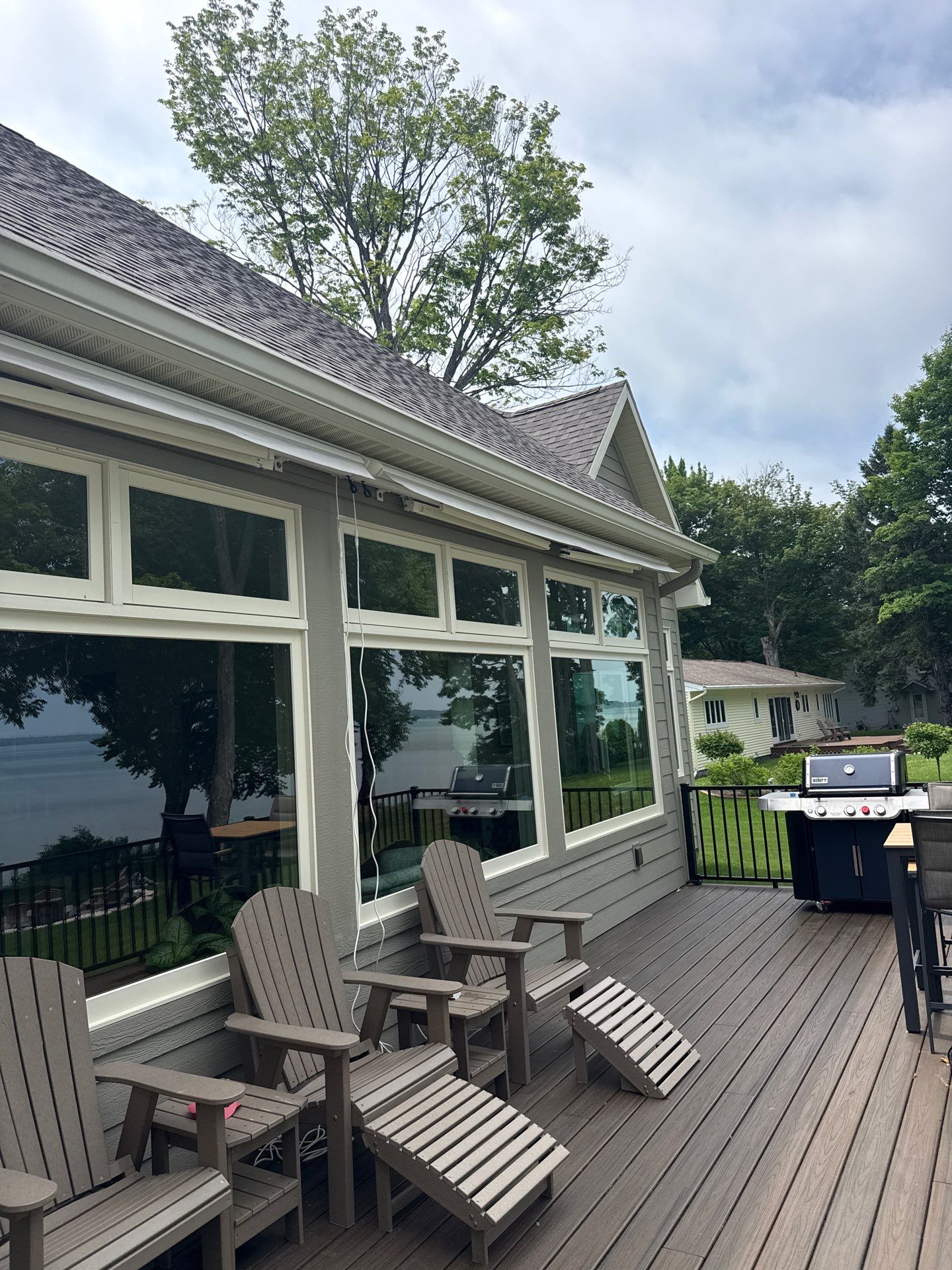 Sunesta Retractable Awning Installation for Sault Sainte Marie Lakeside Deck by Rainbow Seamless Systems