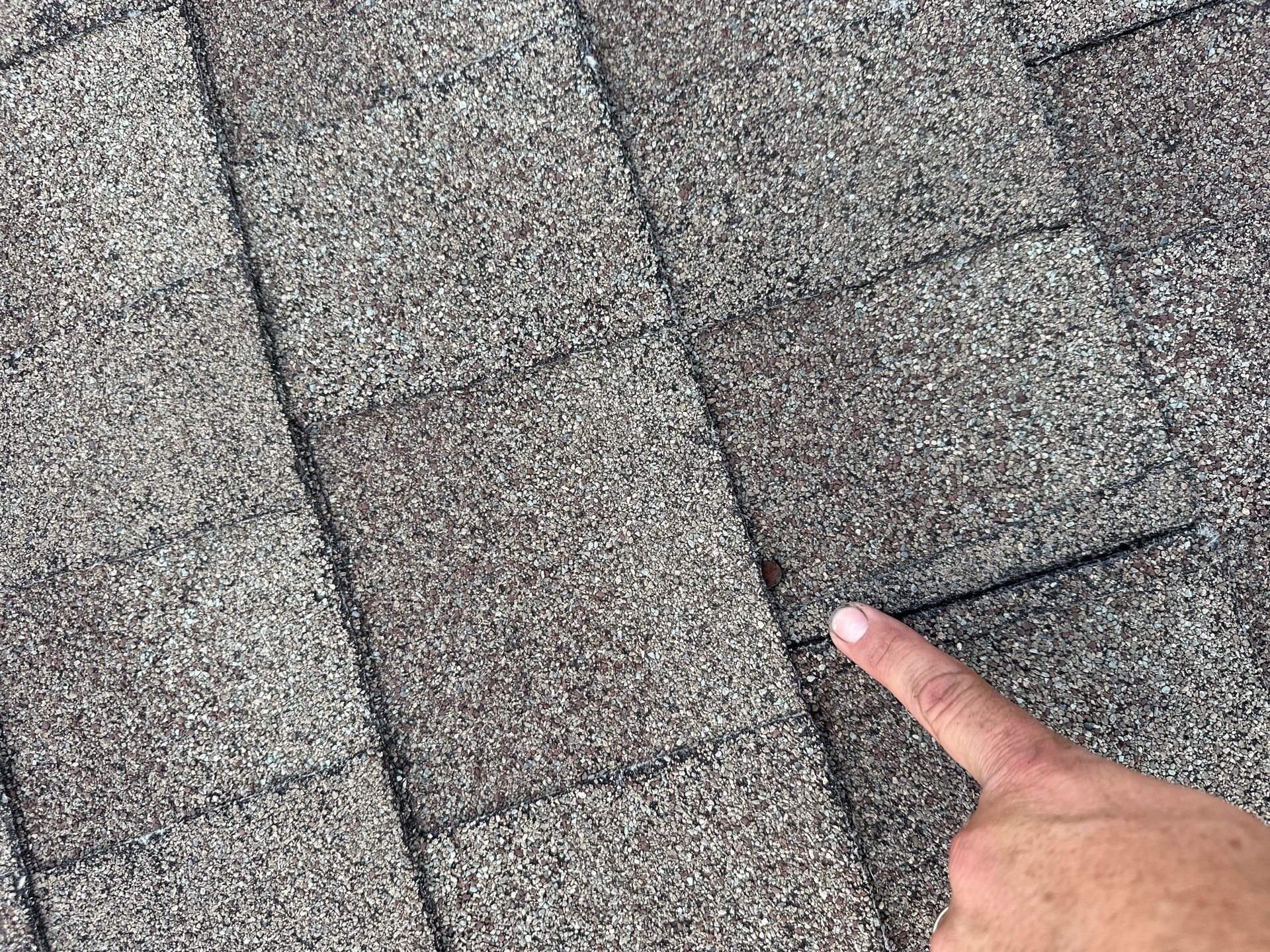 Roof Damage  by Zeus Exteriors