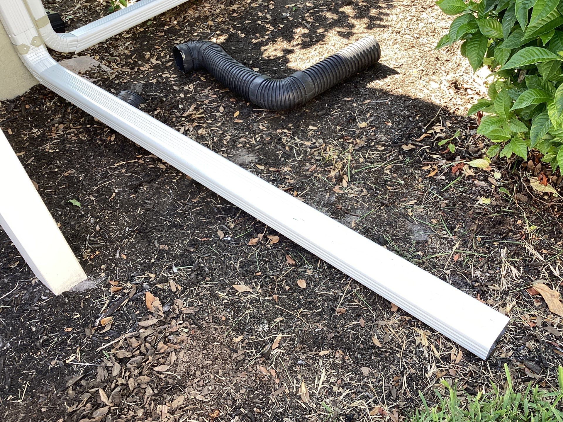 White Gutter Installation in Sarasota FL by Gutter Professors