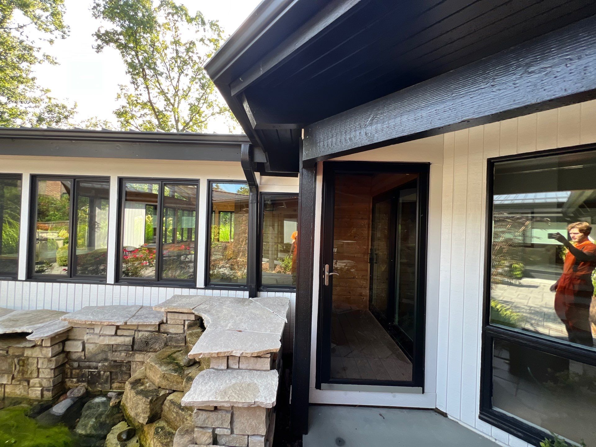 Complete Exterior House, Bluestone & Garage Floor Cleaning by Northern Power Washing LLC.