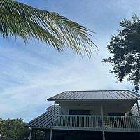 24ga 1.5" Mechanical Seam Mansard brown by Total Roofing System The Metal Roof Experts