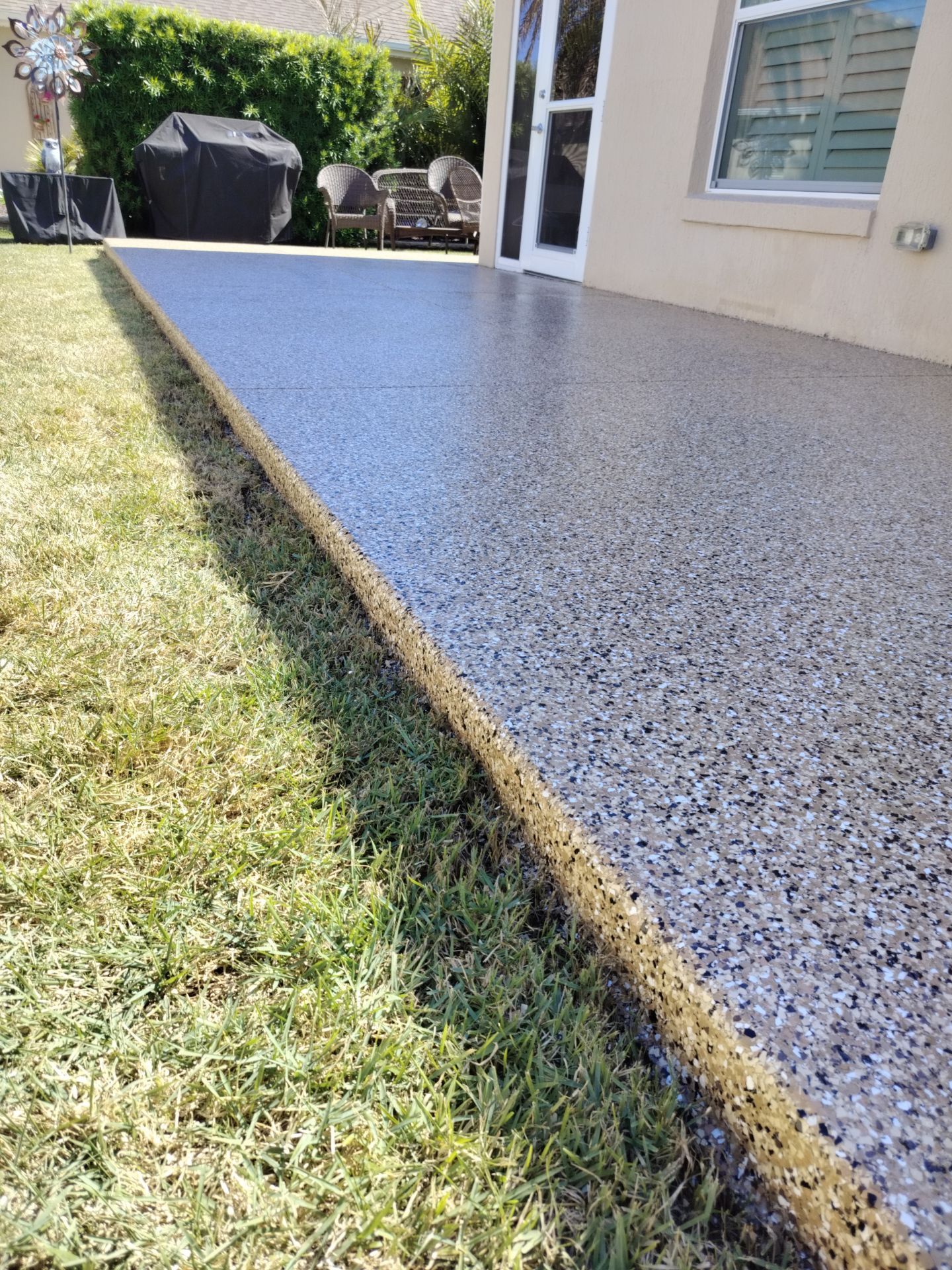 Lanai in Sandstone  by Innovative Concrete Coatings 