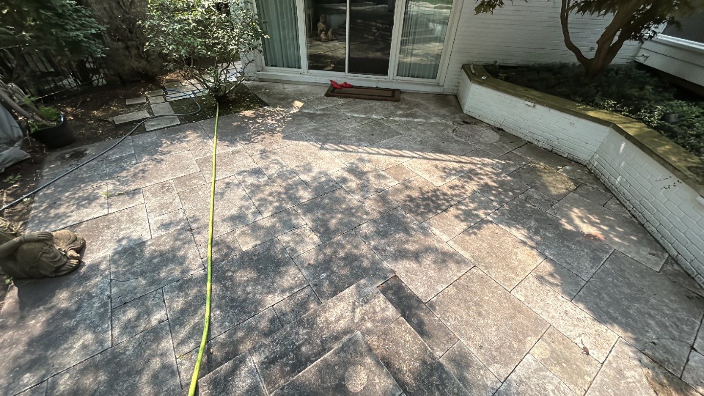 marble patio cleaning and sanding using Polysweep polymeric sand by Northern Power Washing LLC.