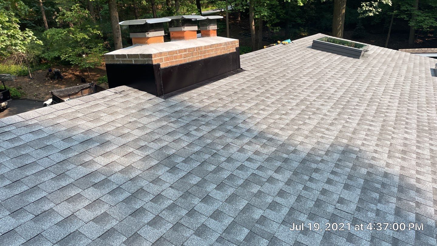 Deckhouse Roof Replacement by American Home Contractors