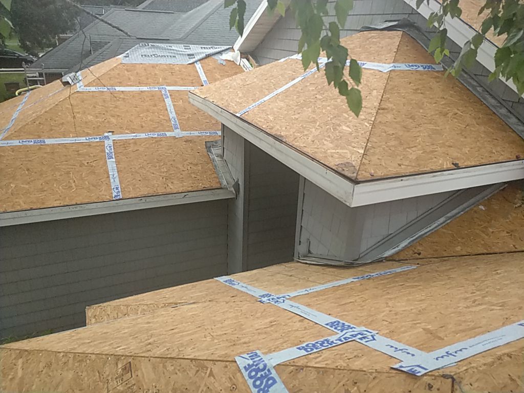 Residential Roofing Installation using Roof Replacement by American Roofing & Construction LLC