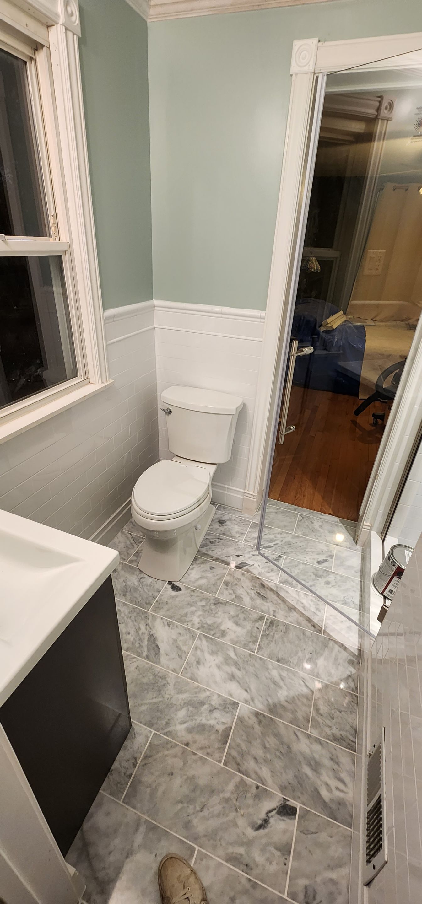 Full bathroom, tile shower, tile floor, tile wainscoting by The Shower Company