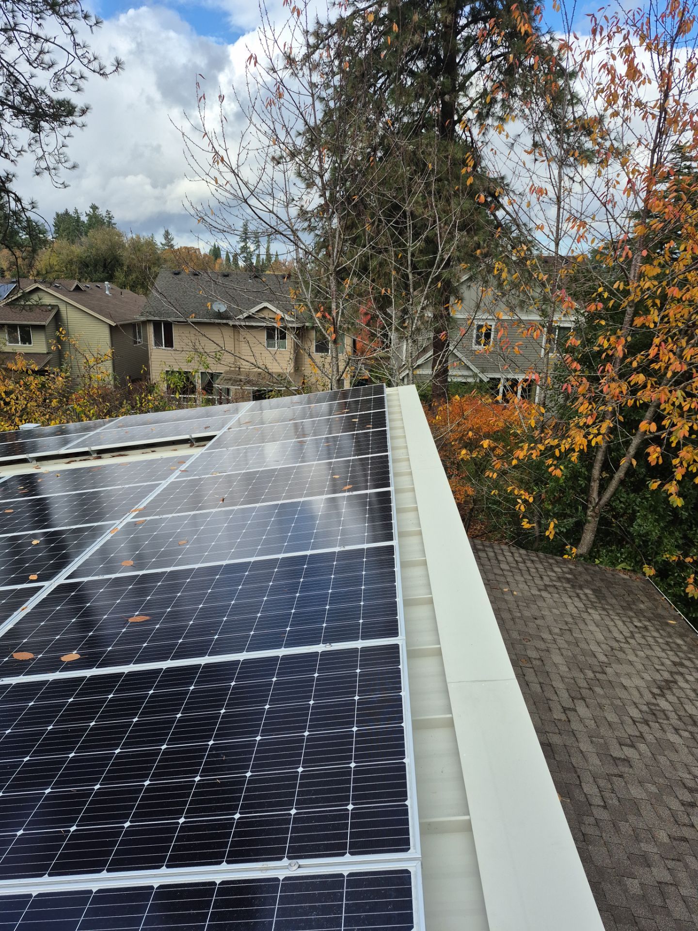 New Metal Roof and replace solar panels by Hawthorne General Construction